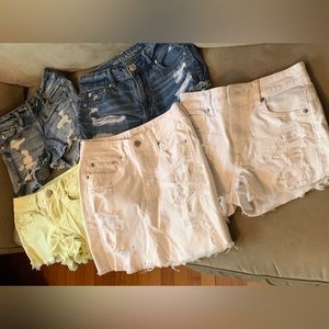 Women’s bundle of 5 pair American Eagle distressed shorts and one skirt.